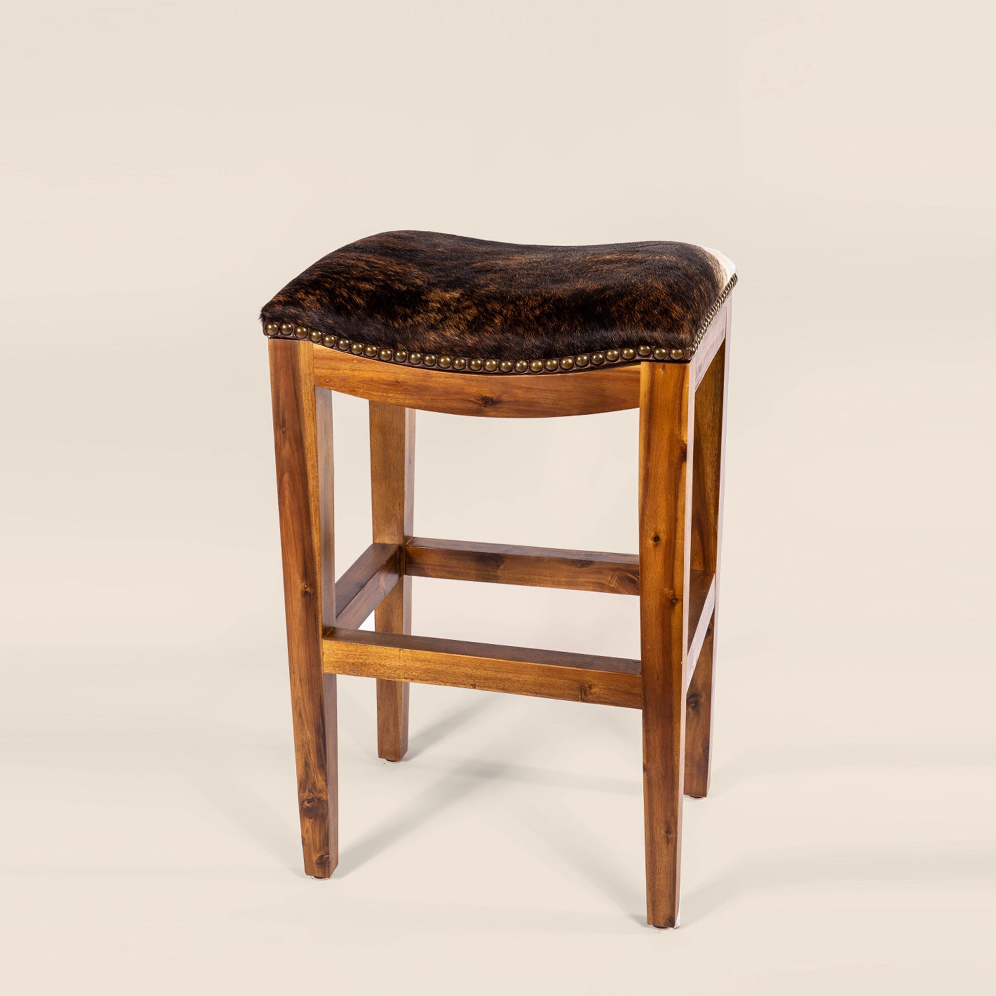 Platzer Saddle Stool in dark brown cowhide leather – front view