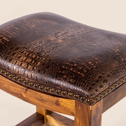 Platzer Saddle Stool in dark brown crocodile leather – detailed view