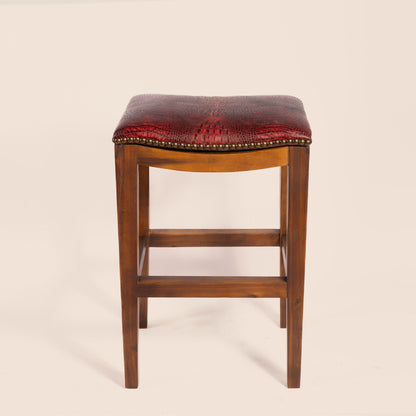 Platzer Saddle Stool in red crocodile leather – front view