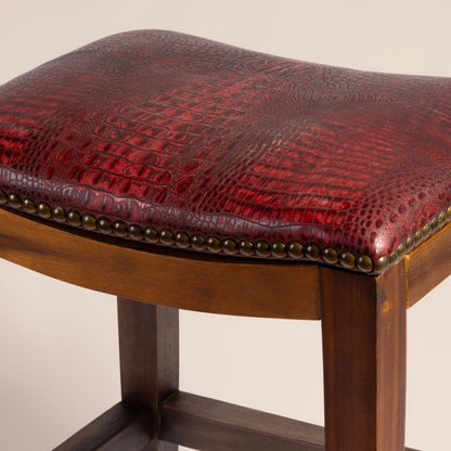 Platzer Saddle Stool in red crocodile leather – detailed view