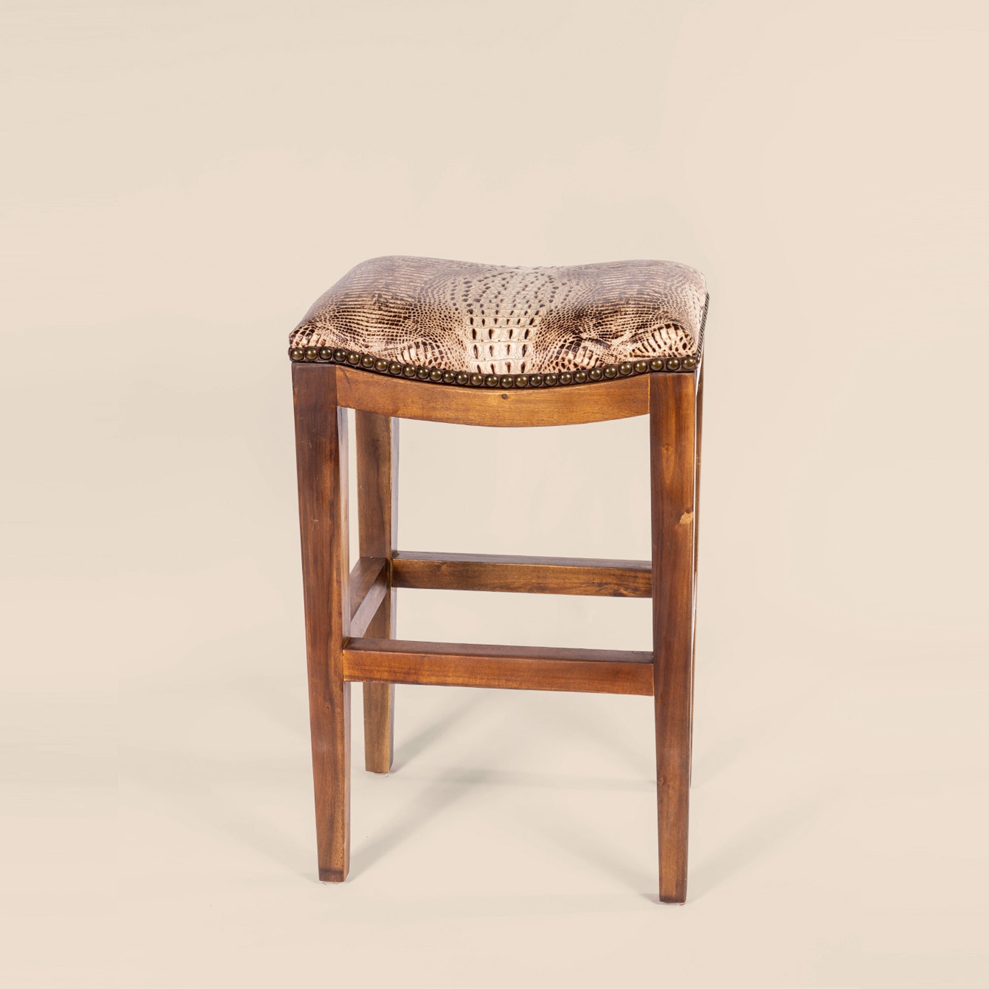 Platzer Saddle Stool in white crocodile leather – front view