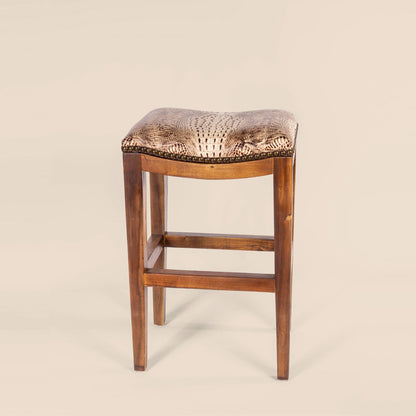 Platzer Saddle Stool in white crocodile leather – front view