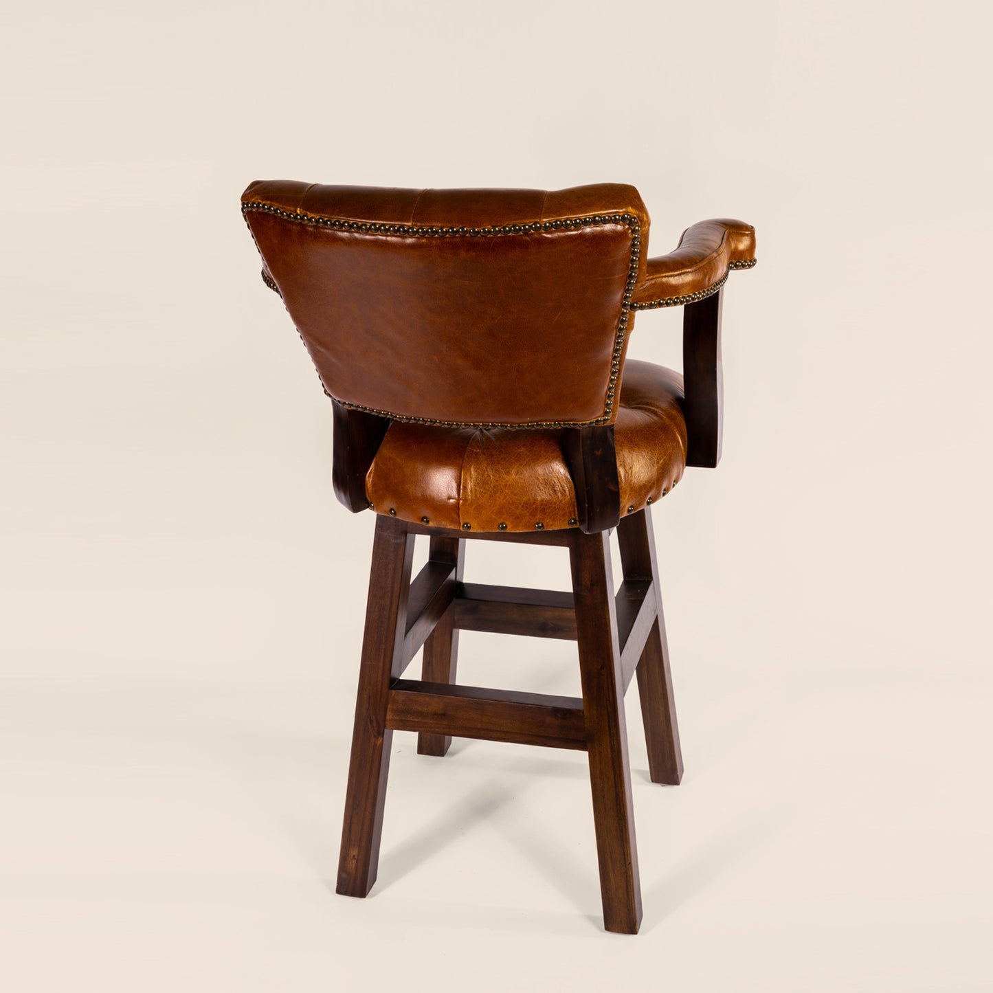 Trophy Swivel Stool in tufted leather – back view