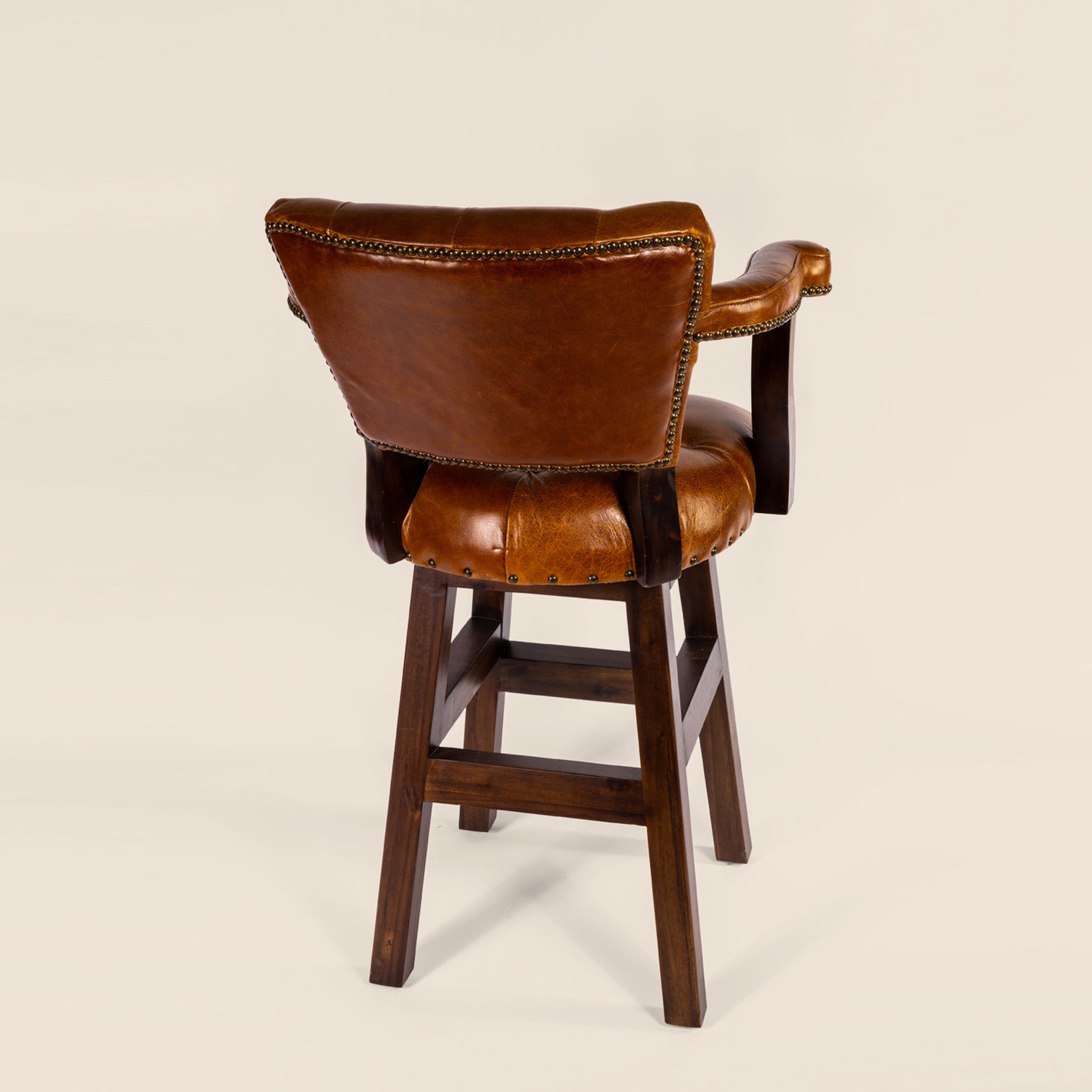 Trophy Swivel Stool in tufted leather – back view