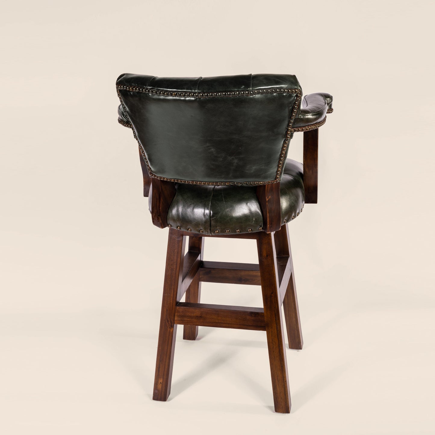 Trophy Swivel Stool in tufted leather – back view