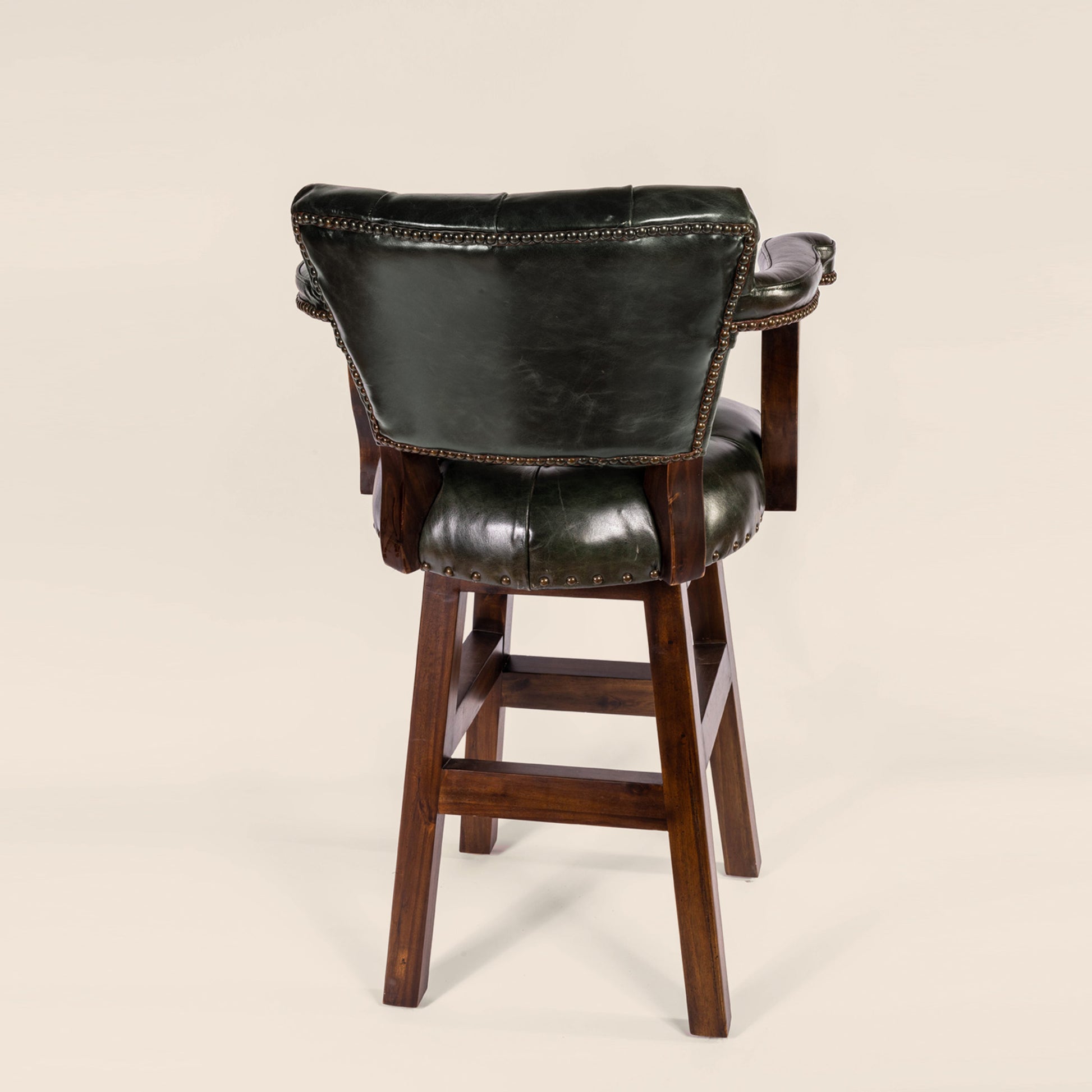 Trophy Swivel Stool in tufted leather – back view